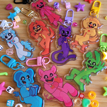 smiling critters charms - $10